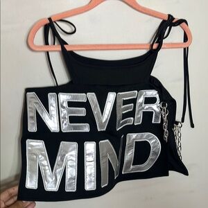 Black cutout mini skirt with NEVER MIND graphic, whale tail thong, silver chains